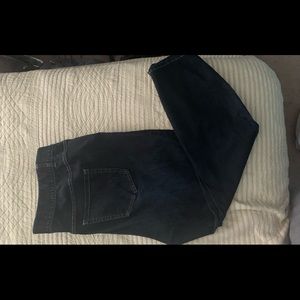 Ladies faded, slightly distressed skinny jeans